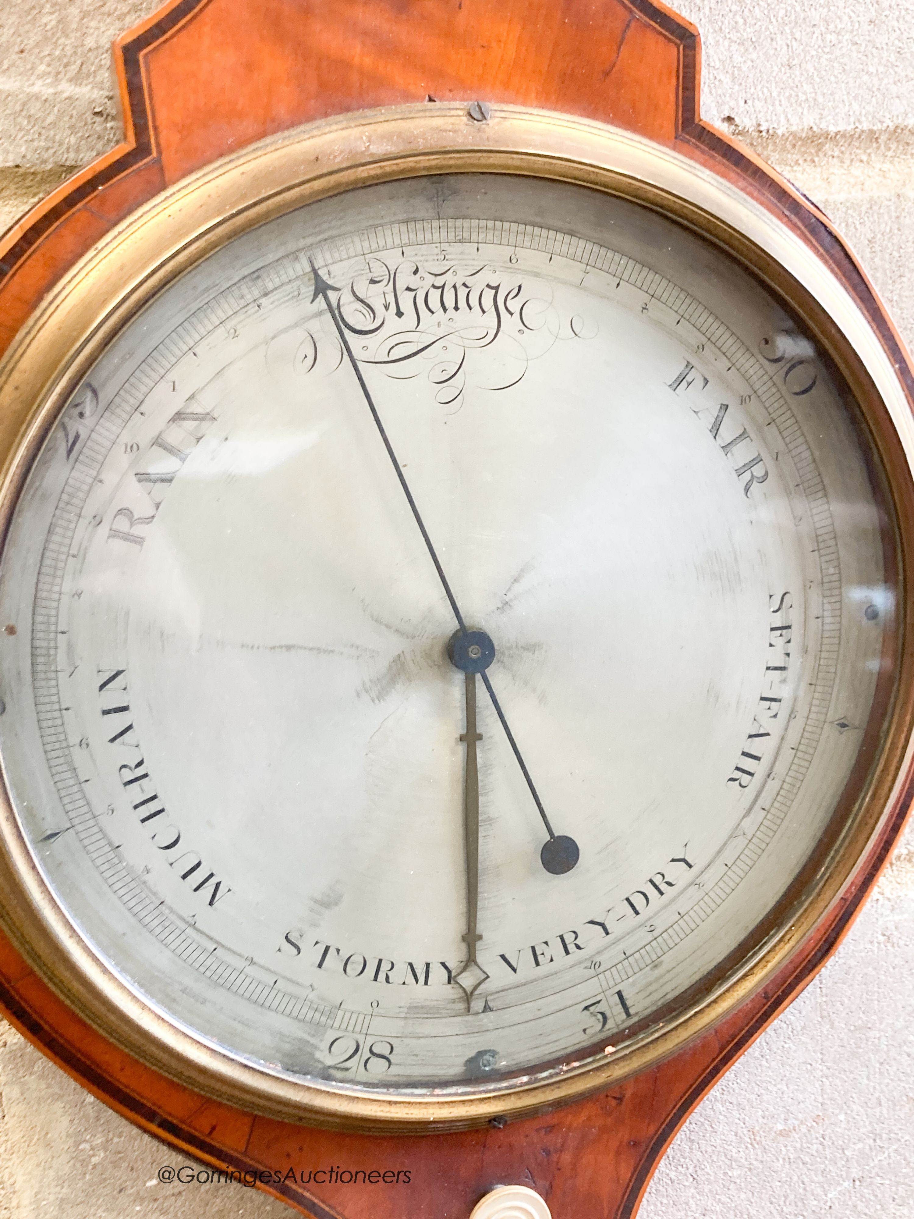 A George III satinwood wheel barometer, height 108cm